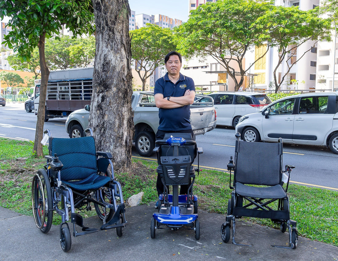ELFIGO Mobility founder posing with 2 electric motorised wheelchairs and 1 mobility scooter