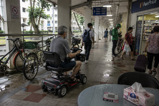 The Unexpected Fatigue of Navigating Around Parked Bicycles Along Sheltered Estate Walkways
